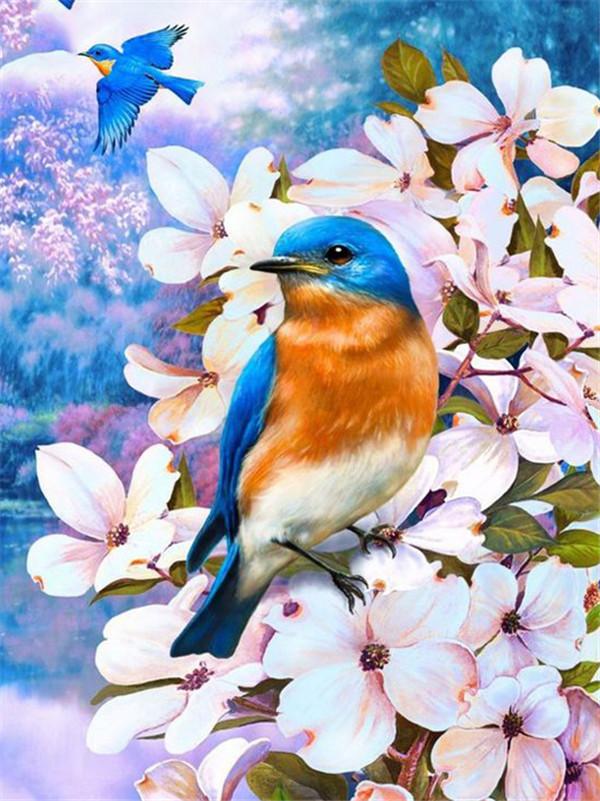 Una pintura de diamantes llamado 'Pájaro azul y flores' - Meencantalapinturadediamantes